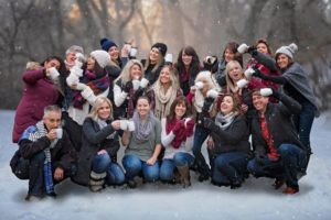 Team photo in snow with white mugs