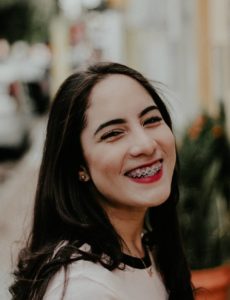 girl smiling with braces