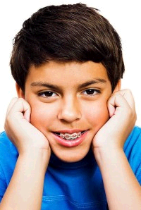 young boy with braces